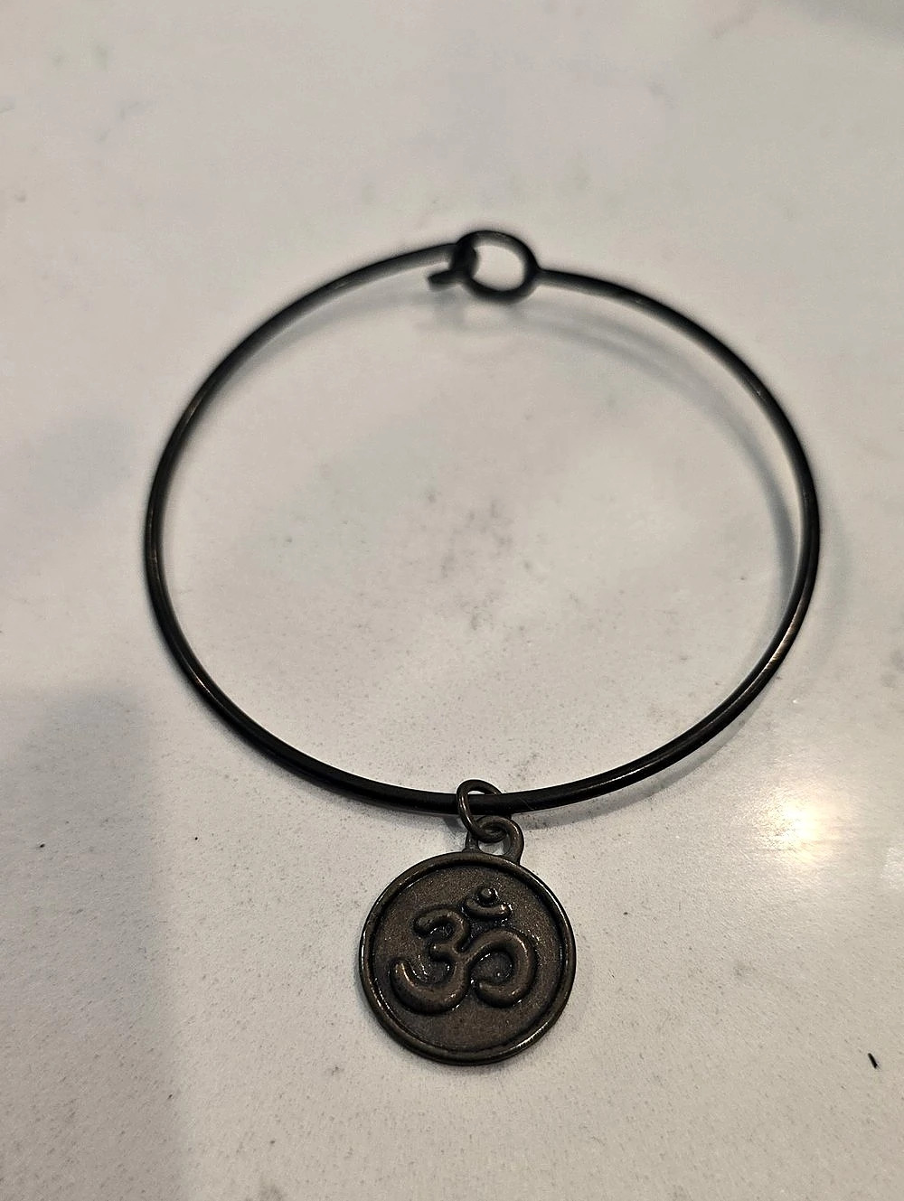 Om Charm Bangle in Black